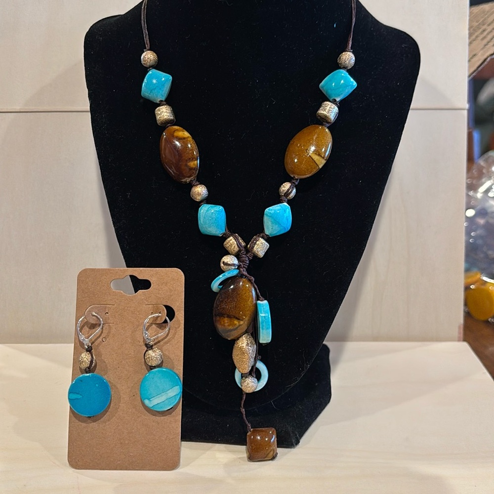Necklace glass beads color turquoise, brown and gold. With matching earrings.